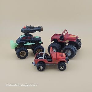 Vtg Lot Of 3 1990's Diecast Monster Trucks Jeep Cars Multi-Color Collectible Toy